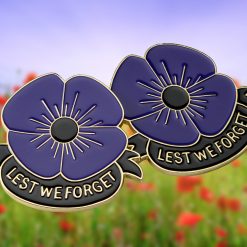 Red poppies in the field under the rays of the sun